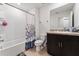 Bathroom featuring a shower, toilet, vanity and tile floors at 1818 Katz Crossing Dr, Kissimmee, FL 34744