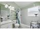 Full bathroom featuring modern fixtures, a shower-tub combo, and ample lighting at 1823 Ashton E Dr, St Cloud, FL 34771