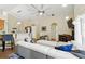 Open living area with tiled floors, views of the kitchen, and abundant natural light at 1823 Ashton E Dr, St Cloud, FL 34771