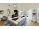 Open living area featuring lots of natural light, TV, and views into the kitchen at 1823 Ashton E Dr, St Cloud, FL 34771