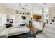 Open living room with modern furnishings and views into the bright kitchen at 1823 Ashton E Dr, St Cloud, FL 34771
