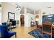 Open concept living space with dining area and a cozy office nook at 1823 Ashton E Dr, St Cloud, FL 34771