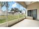 Enclosed screened porch with nice backyard views and a convenient sliding glass door at 1823 Ashton E Dr, St Cloud, FL 34771