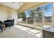 Relaxing screened porch with a ceiling fan that allows ample outdoor views and natural light at 1823 Ashton E Dr, St Cloud, FL 34771