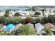 This aerial image shows the property's location near a lake and other homes in a retirement community at 2365 Paulette Dr, Haines City, FL 33844