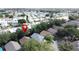 An aerial view shows the property's location in the Bay Indies retirement community with nearby homes and amenities at 2365 Paulette Dr, Haines City, FL 33844