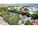 An aerial view shows the property's location near a lake in the retirement community of Bay Indies at 2365 Paulette Dr, Haines City, FL 33844