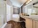 Bathroom featuring a soaking tub, separate shower, and a vanity with granite countertop at 2365 Paulette Dr, Haines City, FL 33844