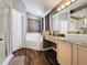 Bathroom with tub, shower, vanity, and lots of lighting at 2365 Paulette Dr, Haines City, FL 33844