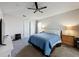 Spacious bedroom featuring carpeted floors, ceiling fan, and neutral paint, creating a serene space at 2365 Paulette Dr, Haines City, FL 33844
