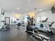 Bright gym featuring modern exercise equipment, including treadmills, elliptical and weight machines at 2365 Paulette Dr, Haines City, FL 33844