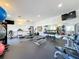 Well-equipped gym featuring treadmills, weights, and fitness machines for a healthy lifestyle at 2365 Paulette Dr, Haines City, FL 33844