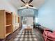 Bright living room with high ceilings, large window, hardwood floors, and access to the outdoor space at 2365 Paulette Dr, Haines City, FL 33844