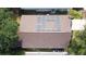 An aerial view shows a roof with solar panels at 2365 Paulette Dr, Haines City, FL 33844
