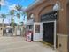Entrance to the Marketplace at Regal Palms, featuring groceries, gifts, and swimwear at 247 Verona Ave, Davenport, FL 33897