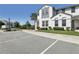 Attractive townhome with well-manicured landscaping and ample parking spaces at 256 Captiva Dr, Davenport, FL 33896