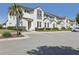 Attractive townhome with well-manicured landscaping and ample parking spaces at 256 Captiva Dr, Davenport, FL 33896