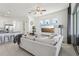 Spacious living room featuring a large TV and comfortable seating arrangement at 256 Captiva Dr, Davenport, FL 33896