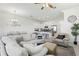 Cozy living room with open access to the kitchen and dining area at 256 Captiva Dr, Davenport, FL 33896