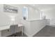 Upstairs loft area with desk, chair, carpet flooring, natural lighting and modern decor at 256 Captiva Dr, Davenport, FL 33896