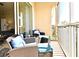 This balcony features outdoor furniture and lights at 2778 Almaton Loop # 403, Kissimmee, FL 34747
