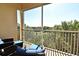 This balcony features outdoor furniture and a scenic view at 2778 Almaton Loop # 403, Kissimmee, FL 34747