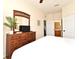 Bedroom with a dresser and ensuite bathroom at 2778 Almaton Loop # 403, Kissimmee, FL 34747