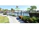 Amazing community pool with splash pad, lush landscaping, and an inviting recreational space at 2778 Almaton Loop # 403, Kissimmee, FL 34747
