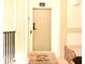 Inviting front door with decorative welcome mat, creating a warm entrance to the home at 2778 Almaton Loop # 403, Kissimmee, FL 34747