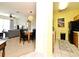 Open-concept living and dining area with view into kitchen, perfect for modern living at 2778 Almaton Loop # 403, Kissimmee, FL 34747