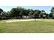 Outdoor sand volleyball court available to residents, surrounded by well-maintained lawns and landscaping at 2778 Almaton Loop # 403, Kissimmee, FL 34747