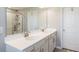 Bathroom featuring a double sink vanity with white countertops and a glass-enclosed shower at 2821 Cathy Blvd, Winter Haven, FL 33880