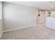 This spacious and bright bonus room showcases neutral walls, plush carpet, and versatile layout for flexible use at 2821 Cathy Blvd, Winter Haven, FL 33880