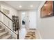 Hallway leading to an office space, features stairs, and neutral tones with modern decor at 2821 Cathy Blvd, Winter Haven, FL 33880