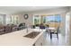 Open kitchen featuring a view to the dining area and access to the backyard through sliding glass doors at 2821 Cathy Blvd, Winter Haven, FL 33880