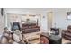 Open-concept living room with hardwood floors and a view of the kitchen at 2821 Cathy Blvd, Winter Haven, FL 33880