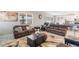 Cozy living room with wood-look floors, comfortable seating, and plenty of natural light at 2821 Cathy Blvd, Winter Haven, FL 33880