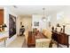 Elegant dining room featuring a large table for gathering and abundant natural light at 2901 Puerta Del Sol Blvd, Kissimmee, FL 34744