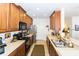 Functional kitchen with ample cabinet space, stainless steel appliances, and a convenient layout at 2901 Puerta Del Sol Blvd, Kissimmee, FL 34744