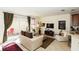 Bright, open living area with patio access, comfortable seating, and neutral decor at 2901 Puerta Del Sol Blvd, Kissimmee, FL 34744