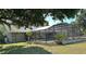 Large screened-in pool and patio area overlooks an expansive, lush backyard at 3328 Wax Berry Ct, Windermere, FL 34786