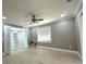 This spacious bedroom boasts hardwood floors, large closet, and a fan at 3328 Wax Berry Ct, Windermere, FL 34786