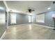 Bright bedroom features hardwood floors, ample natural light from the window, and neutral wall colors at 3328 Wax Berry Ct, Windermere, FL 34786