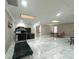 Spacious bonus room with skylights, offering a versatile area for recreation, fitness, and a home office setup at 3328 Wax Berry Ct, Windermere, FL 34786