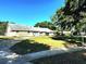 A lovely one-story home with a well-maintained lawn and a paved driveway at 3328 Wax Berry Ct, Windermere, FL 34786
