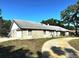 Charming one-story home featuring a two-car garage, stone accents, and a paved driveway at 3328 Wax Berry Ct, Windermere, FL 34786