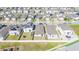 Extensive neighborhood layout with solar panel installations, offering insights into community planning and energy efficiency at 3451 Monaco Ln, Davenport, FL 33897
