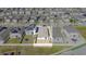 Expansive view showcasing numerous homes with solar panels, offering a glimpse into eco-friendly community initiatives at 3451 Monaco Ln, Davenport, FL 33897