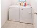 Functional laundry area with a washer and dryer set, providing convenience for everyday chores at 3451 Monaco Ln, Davenport, FL 33897