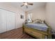 Comfortable bedroom featuring a decorative bed frame, window, and closet at 3890 Prairie Reserve Blvd, Orlando, FL 32824